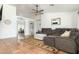 Living room with sectional sofa and access to dining area at 9546 E Anasazi Pl, Gold Canyon, AZ 85118