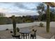 Desert landscape views from a patio with small table and chairs at 9546 E Anasazi Pl, Gold Canyon, AZ 85118