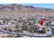 Aerial view of neighborhood with mountain backdrop and address marker at 9900 E Desert Trail Ln, Gold Canyon, AZ 85118