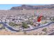 Aerial view of neighborhood with mountain backdrop and address marker at 9900 E Desert Trail Ln, Gold Canyon, AZ 85118