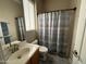 Bathroom featuring a vanity with a sink and mirror, a toilet, and a shower with a curtain at 9900 E Desert Trail Ln, Gold Canyon, AZ 85118