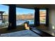 Relaxing bedroom view overlooking the pool and serene mountain backdrop at 9900 E Desert Trail Ln, Gold Canyon, AZ 85118