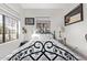 Cozy bedroom with a metal bed frame and window seating at 1002 E Palm Ln, Phoenix, AZ 85006