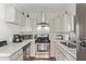 Efficient kitchen with stainless steel appliances at 1002 E Palm Ln, Phoenix, AZ 85006