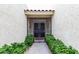 Front entrance with gate and landscaping at 10546 E Topaz Cir, Scottsdale, AZ 85258