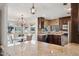 Kitchen with granite countertops and dark wood cabinets at 10546 E Topaz Cir, Scottsdale, AZ 85258