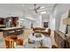 Airy living space with a vaulted ceiling, skylight, and inviting seating arrangement at 10546 E Topaz Cir, Scottsdale, AZ 85258