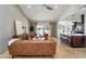 Bright living room with a modern design, open floor plan, and a seamless flow to the kitchen at 10546 E Topaz Cir, Scottsdale, AZ 85258