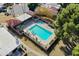 Community pool and spa with lounge chairs at 10546 E Topaz Cir, Scottsdale, AZ 85258