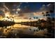 Scenic sunset view over calm lake water at 10546 E Topaz Cir, Scottsdale, AZ 85258