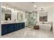 Luxurious bathroom with soaking tub, walk-in shower, and double vanity at 1078 W Spur Ct, Gilbert, AZ 85233