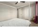 Cozy bedroom with a four-poster bed and ample closet space at 1078 W Spur Ct, Gilbert, AZ 85233