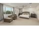 Spacious bedroom with plush carpet and large windows at 1078 W Spur Ct, Gilbert, AZ 85233