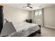 Well-lit bedroom with a queen-size bed and large windows at 1078 W Spur Ct, Gilbert, AZ 85233