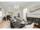 Spacious dining area with a large wooden table, perfect for Gathering gatherings at 1078 W Spur Ct, Gilbert, AZ 85233