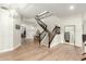 Elegant entryway with hardwood floors, a grand staircase, and a large mirror at 1078 W Spur Ct, Gilbert, AZ 85233