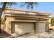 Two-story house with three-car garage and neutral color scheme at 1078 W Spur Ct, Gilbert, AZ 85233