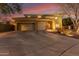 Two-story house with a three-car garage and landscaped front yard at 1078 W Spur Ct, Gilbert, AZ 85233
