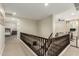 Upstairs hallway with access to bedrooms and loft area at 1078 W Spur Ct, Gilbert, AZ 85233