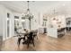 Bright kitchen with white cabinets, quartz countertops, and stainless steel appliances at 1078 W Spur Ct, Gilbert, AZ 85233