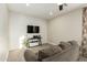 Relaxing media room featuring a large TV and comfortable seating at 1078 W Spur Ct, Gilbert, AZ 85233
