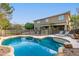 Inviting swimming pool with surrounding patio and lounge chairs at 1078 W Spur Ct, Gilbert, AZ 85233