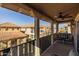 Spacious balcony overlooking the community with seating for two at 1094 S Agnes Ln, Gilbert, AZ 85296