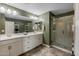 Bathroom with double vanity and walk-in shower at 1094 S Agnes Ln, Gilbert, AZ 85296
