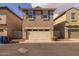 Two-story townhome with attached garage and front yard at 1094 S Agnes Ln, Gilbert, AZ 85296