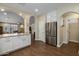 Kitchen with white cabinets, granite counters, and stainless steel appliances at 1094 S Agnes Ln, Gilbert, AZ 85296