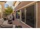 Relaxing patio with seating area, and access to the interior at 1094 S Agnes Ln, Gilbert, AZ 85296