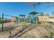 playground with swings and climbing structures at 1094 S Agnes Ln, Gilbert, AZ 85296