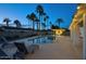 Night view of a refreshing pool and patio area, complete with string lights at 13422 N 52Nd St, Scottsdale, AZ 85254