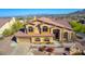 Two-story home with tile roof, large windows, and city views at 14829 N 18Th Pl, Phoenix, AZ 85022