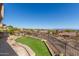 Large backyard with a patio, fire pit, and scenic mountain views at 14829 N 18Th Pl, Phoenix, AZ 85022