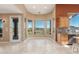 Sunlit dining area with stunning mountain views, tile flooring, and kitchen access at 14829 N 18Th Pl, Phoenix, AZ 85022