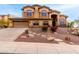 Two story home with landscaped yard and driveway at 14829 N 18Th Pl, Phoenix, AZ 85022