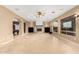 Gathering room with fireplace and large screen at 14829 N 18Th Pl, Phoenix, AZ 85022