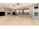 Gathering room with fireplace, tile floors and mountain views at 14829 N 18Th Pl, Phoenix, AZ 85022