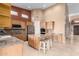 Kitchen features granite countertops, stainless steel appliances, and a large island at 14829 N 18Th Pl, Phoenix, AZ 85022