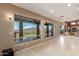 Bright living room with tile floors and expansive windows overlooking a scenic mountain view at 14829 N 18Th Pl, Phoenix, AZ 85022