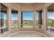 Cozy sunroom with large windows providing panoramic views of the surrounding landscape at 14829 N 18Th Pl, Phoenix, AZ 85022