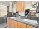 Bathroom featuring double sinks, spacious countertops, and a walk in closet at 1493 E Robinson Way, Chandler, AZ 85225