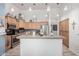 Functional kitchen featuring stainless steel appliances, granite countertops, and ample cabinet space at 1493 E Robinson Way, Chandler, AZ 85225