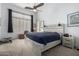 This primary bedroom is spacious and bright, with a ceiling fan, and natural light at 1493 E Robinson Way, Chandler, AZ 85225