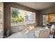 Relaxing balcony with two chairs and view of trees at 15050 N Thompson Peak Pkwy # 2033, Scottsdale, AZ 85260