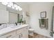 Simple bathroom with a toilet, shower, and vanity at 15050 N Thompson Peak Pkwy # 2033, Scottsdale, AZ 85260