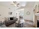 Spacious living room featuring hardwood floors and a cozy seating area at 15050 N Thompson Peak Pkwy # 2033, Scottsdale, AZ 85260