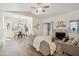 Bright living room with fireplace, hardwood floors, and comfy seating at 15050 N Thompson Peak Pkwy # 2033, Scottsdale, AZ 85260