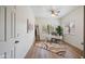 Bright home office with a desk, chair, and large windows at 15050 N Thompson Peak Pkwy # 2033, Scottsdale, AZ 85260